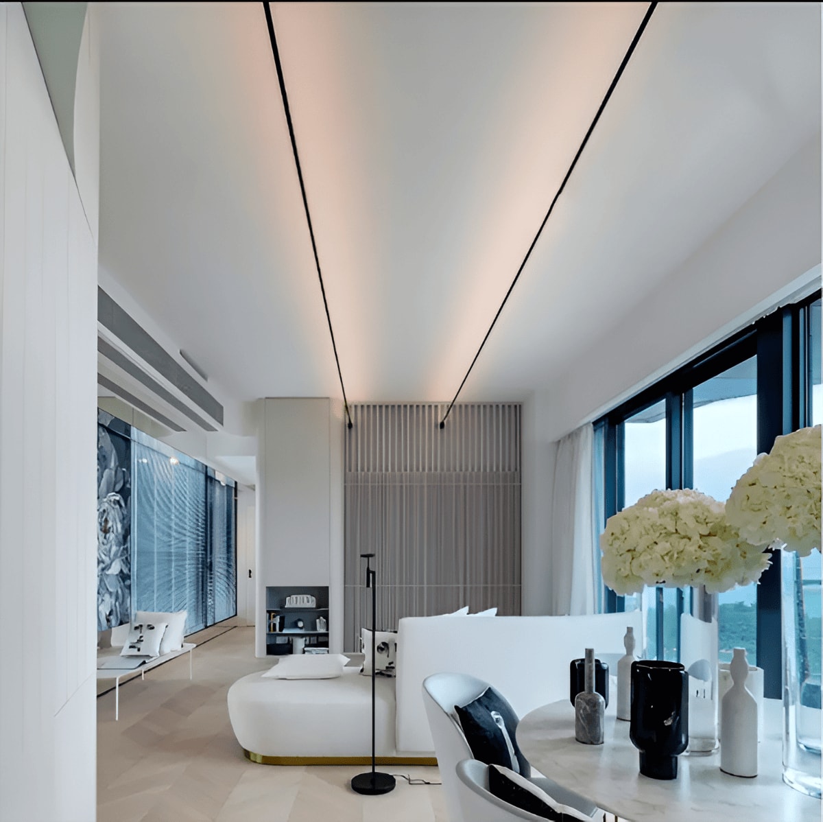 Skyline LED Channel running wall to wall uplighting a modern lounge ceiling