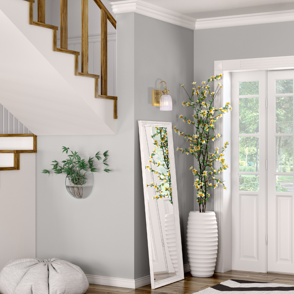 Sino Wall Vanity light Brass with Clear Glass over a tall mirror