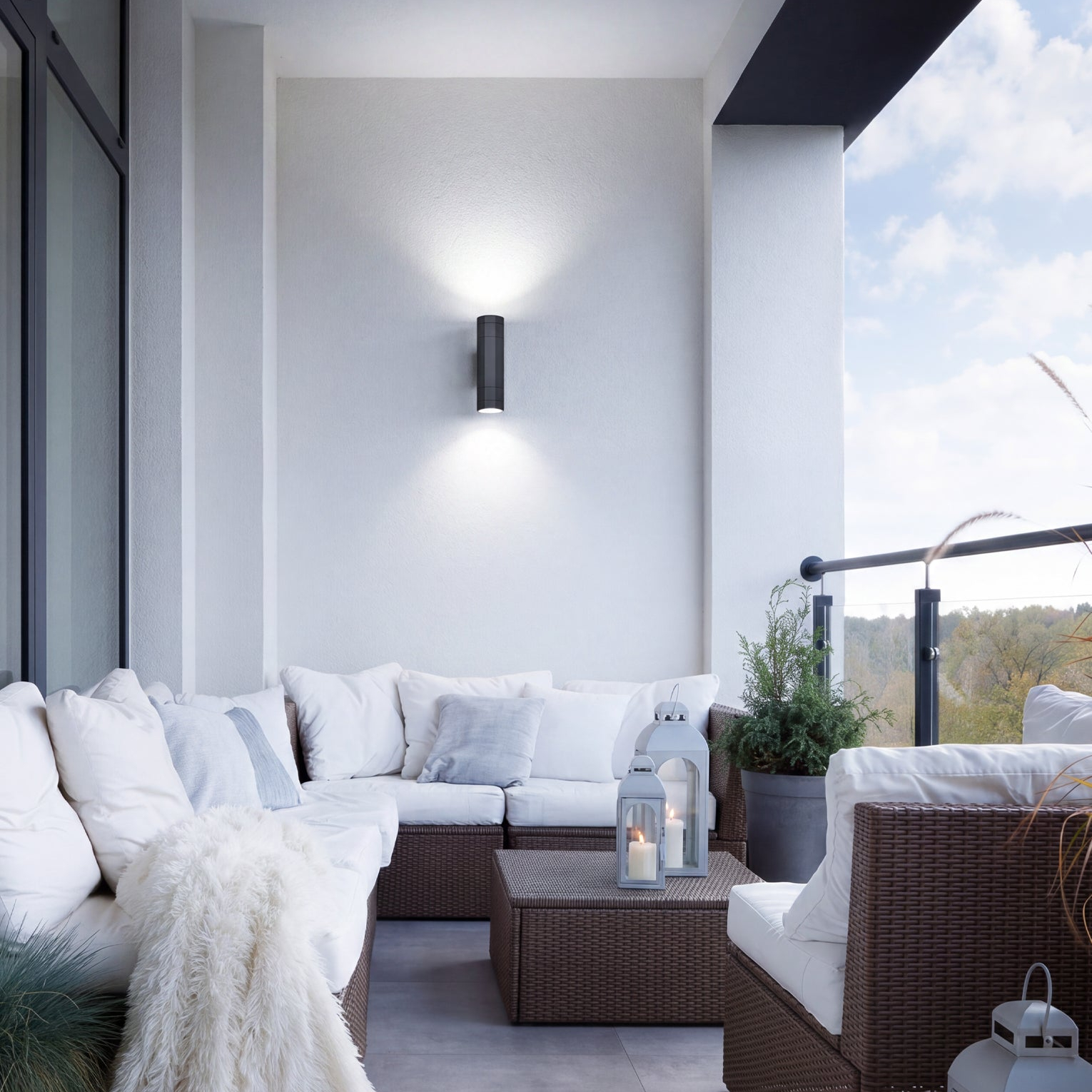 Octo Black Pillar Light on a modern exterior apartment deck